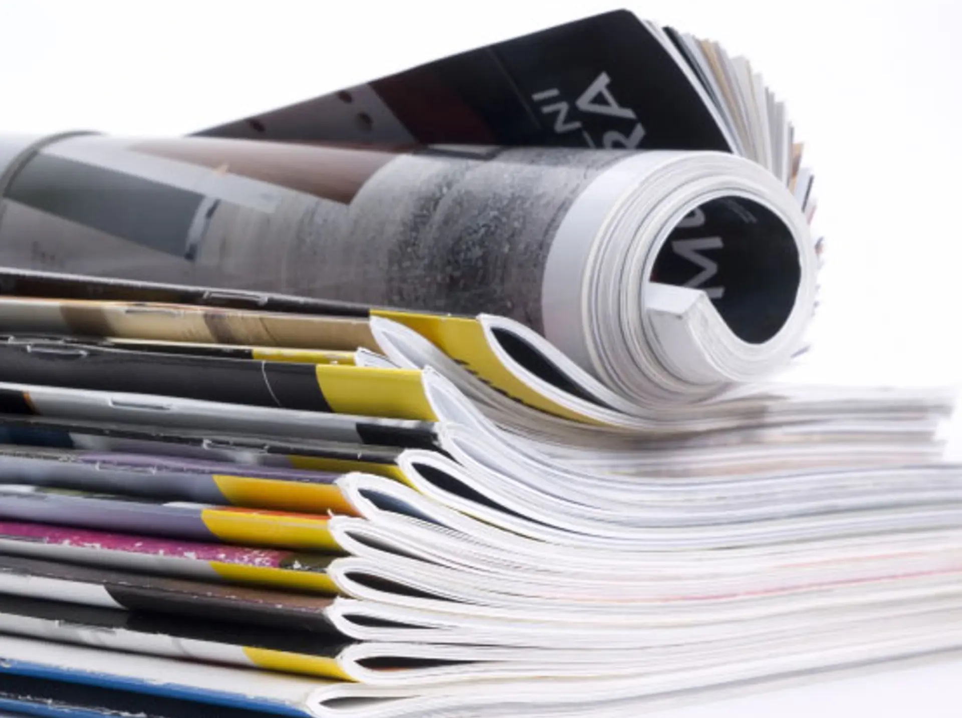 Detail van gebonden magazines op een stapel
